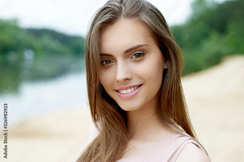 Beautiful cute smiling woman outdoor portrait Stock Photo | Adobe Stock