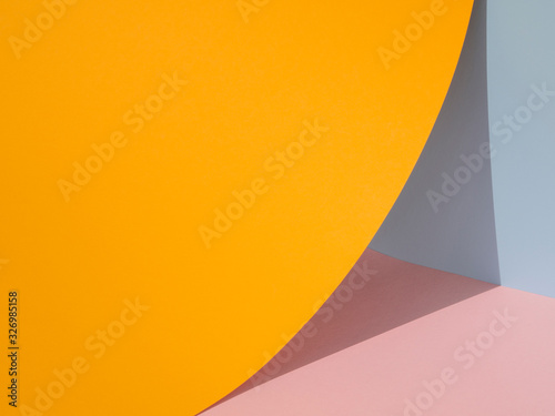 Orange abstract paper shapes with shadow