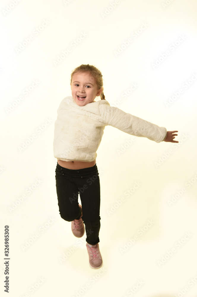 child jumping on white background child jumping on white background