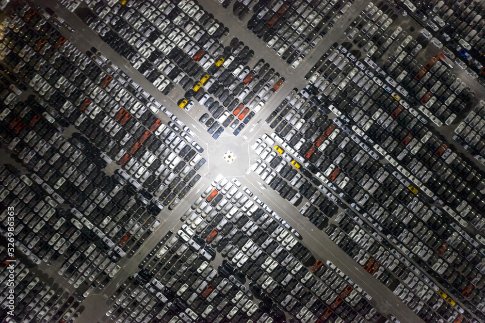 Cars export terminal in export and import business and logistics. Shipping cargo to harbor. Water transport International. Aerial view and top view. Cars export terminal in export and import business and logistics. Shipping cargo to harbor. Water transport International. Aerial view and top view.
