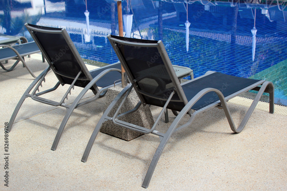 Lounge chairs by the poolside