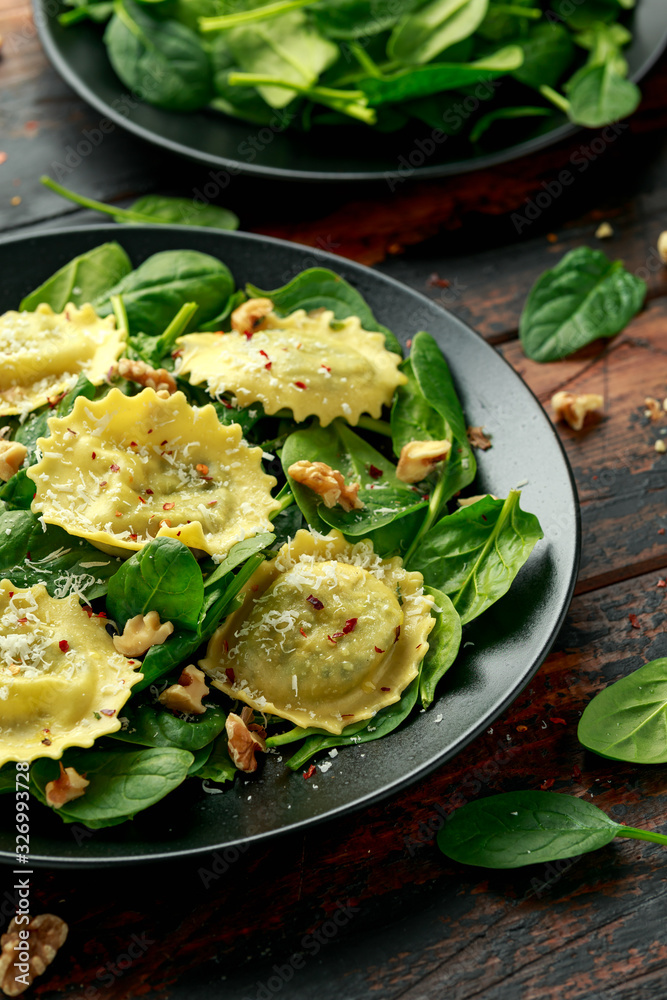 Italian ravioli pasta stuffed with spinach, creamy ricotta cheese. Healthy Vegetarian food Italian ravioli pasta stuffed with spinach, creamy ricotta cheese. Healthy Vegetarian food