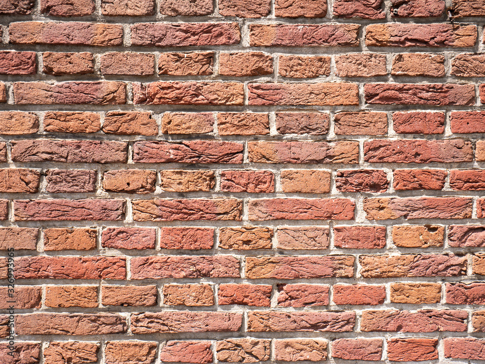 Old brick wall, old texture of red stone blocks closeup Old brick wall, old texture of red stone blocks closeup