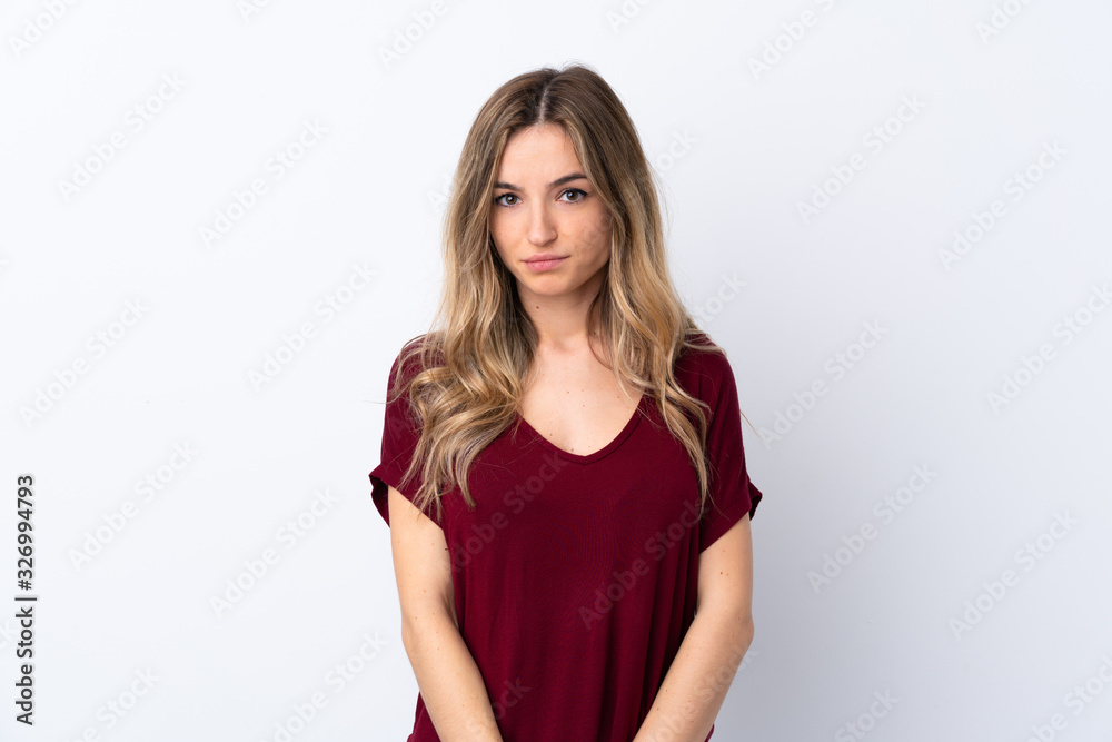 Young woman over isolated white background with sad and depressed expression Young woman over isolated white background with sad and depressed expression