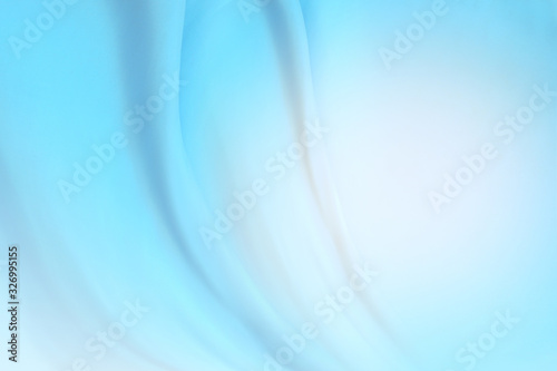 Blue cloth background abstract with soft waves 