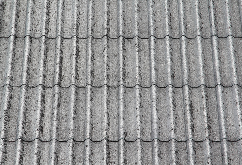 Old asbestos roof tiles texture background.