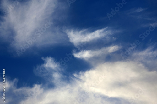 Feather clouds background © Alex Coan