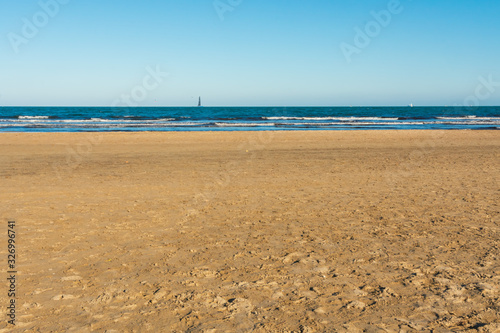 Valencia Beach  Malvarrosa  with sand and blue sky