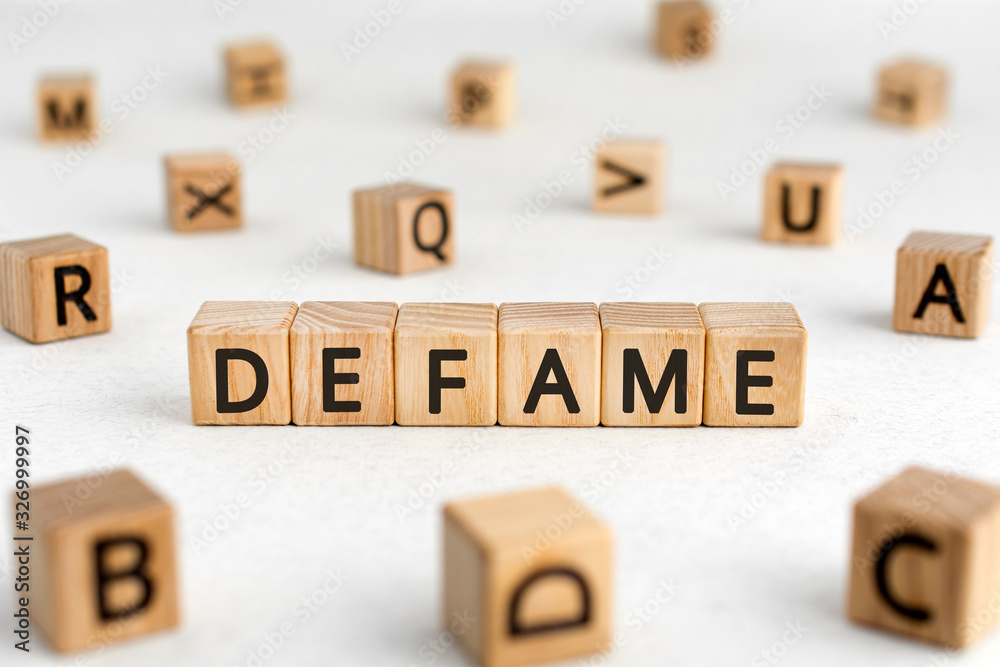 Ταπετσαρία Defame - words from wooden blocks with letters, damage the good reputation defam