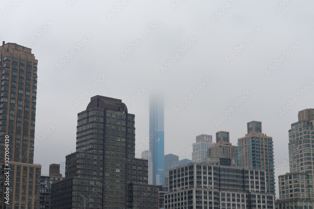Skyscrapers in the Lincoln Square New York City Skyline  along the Hudson River on a Foggy Day