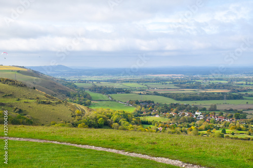 Green fields of Sussex from Devils Dyke, Ditchling Beacon, United Kingdom photo