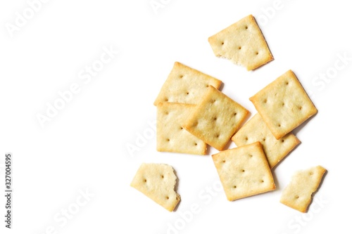 Crispy salty cracker on a white background. Flat lay food photography