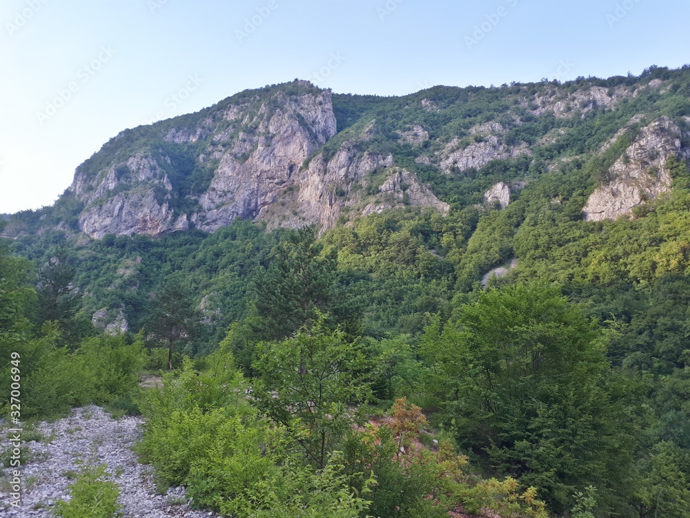 View of rocky hills in the summer evening