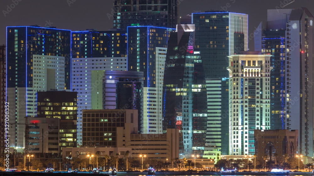 Doha skyscrapers in downtown skyline night timelapse, Qatar, Middle East