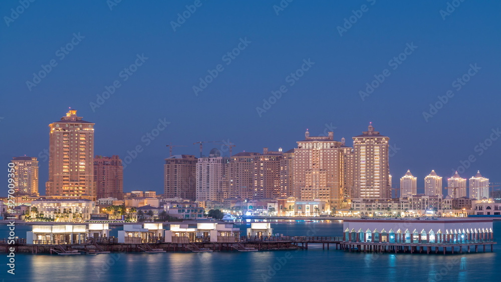 View from Katara Beach day to night timelapse in Doha, Qatar, towards the Pearl