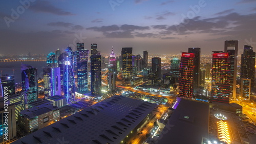 The skyline of the West Bay area from top in Doha day to night timelapse, Qatar.