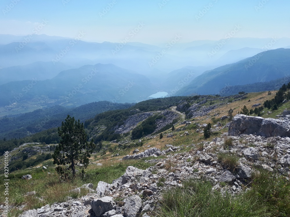 Fototapeta premium Scenic mountain panorama of alps with glacier lake
