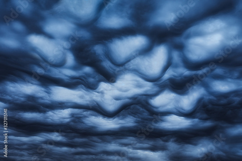 cloudscape of mammatus dark stormy clouds photo