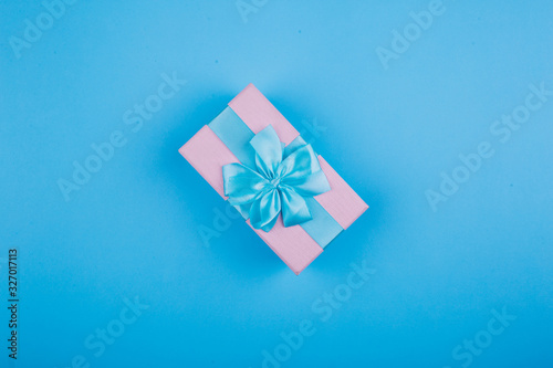 Blue-pink gift on a blue background.