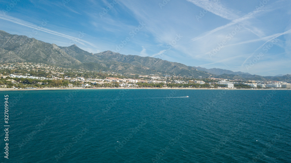 amazing day of navigation in front of marbella coast, malaga, south of spain. View from the sea while sailing