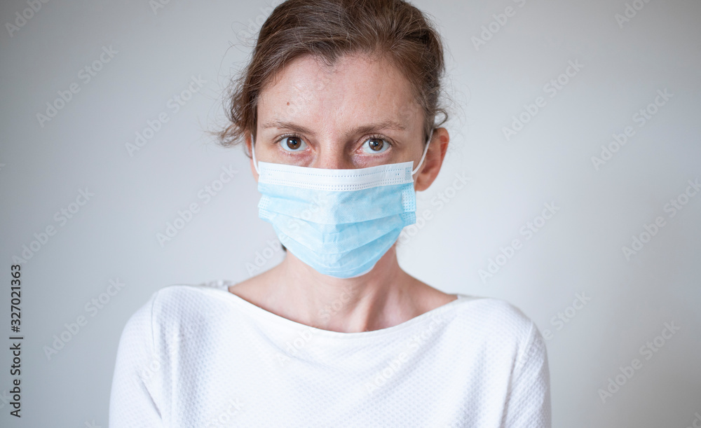 stop coronavirus woman wearing medical mask and raising hand 2019-nCoV fight - spreading stop coronavirus woman wearing medical mask and raising hand 2019-nCoV fight - spreading