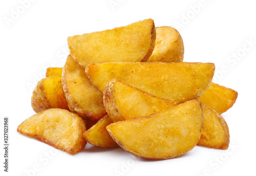 Close-up of fried potato wedges, isolated on white background