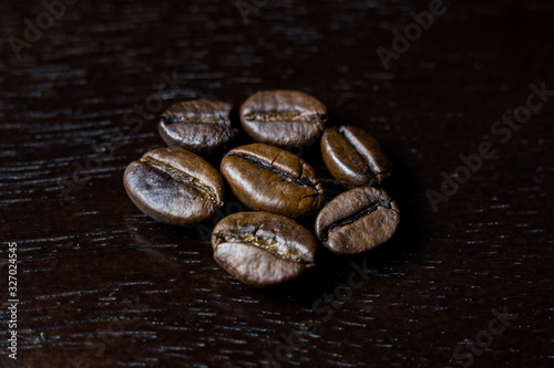coffee beans on wooden background © dyachenkopro