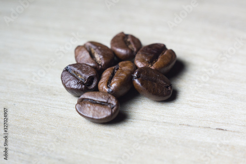 coffee beans on wooden background