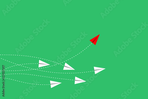 Think differently concept. Red airplane changing direction. New idea, change, trend, courage, creative solution, innovation, business for innovative and unique way concept.