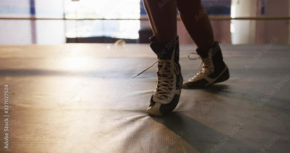 Close up view of foot in boxing ring Close up view of foot in boxing ring