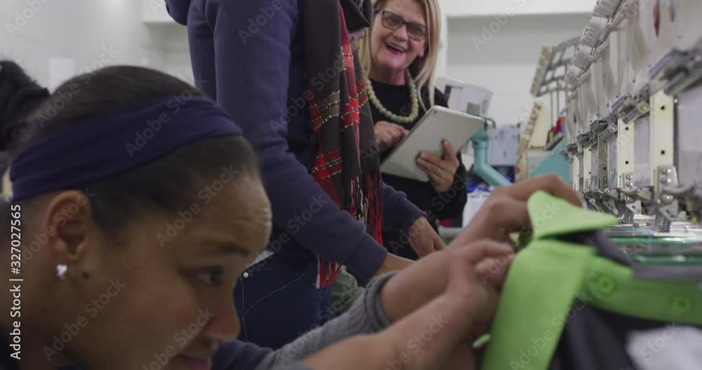 Group of mixed race women working in factory Group of mixed race women working in factory