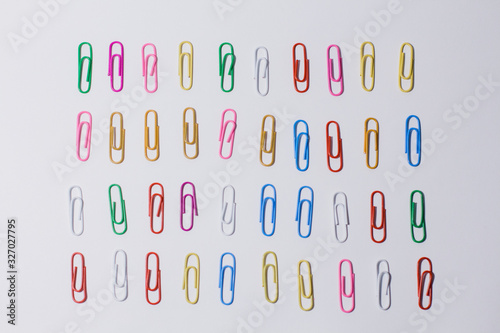 Quadro em tela multicolored paper clips on a white background