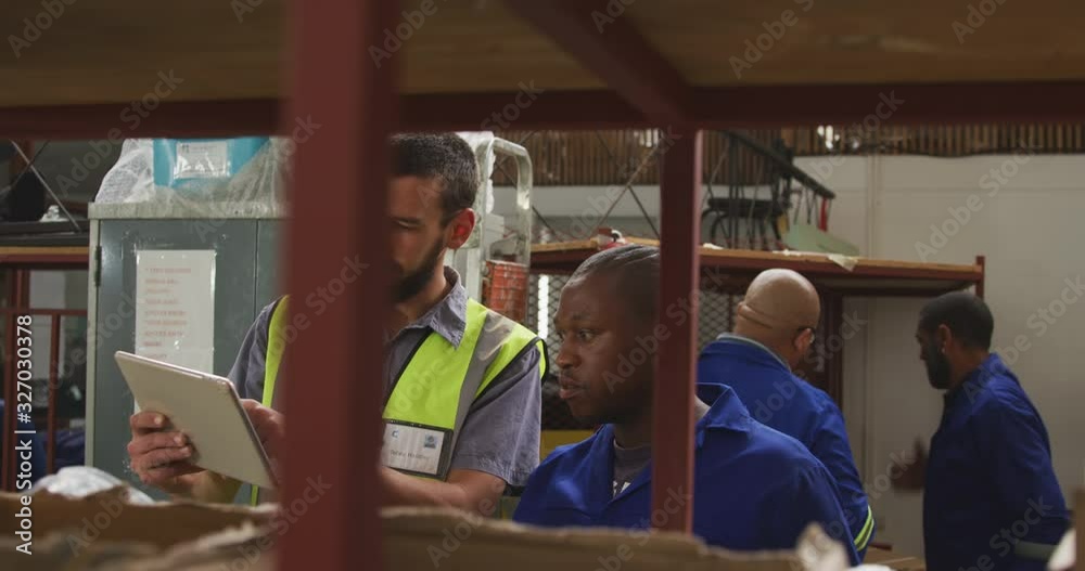 Workers discussing about the work Workers discussing about the work