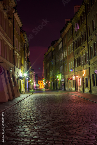 Streets of Warsaw Old Town by the night. Piwna street.