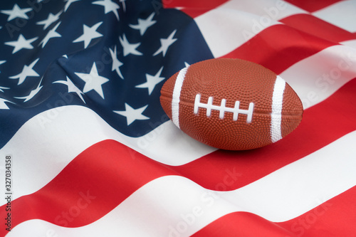 American football rugby ball on usa flag. Sports game