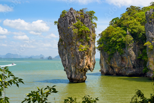 Landscape of amazing James Bond Island and Ko Tapu rock, tropical sea beach near Phuket, Phang Nga Bay, Thailand. Photo from attraction day tour, one-day trip from Krabi province southern Thailand.
