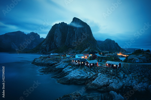 Houses in the Lofoten islands bay. Natural landscape in blue hour