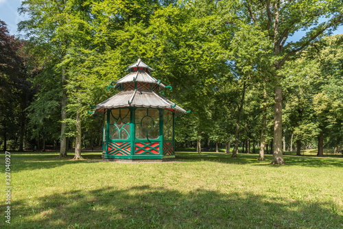Chinese 17th century wooden garden dome, with grass and trees © Erik