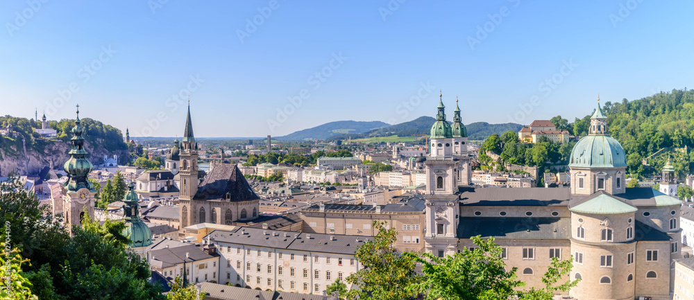 The Franciscan Church, Salzburg Cathedral and Stift St. Peter Salzburg in Salzburg over the banks of Salzach river as seen from Fortress Hohensalzburg
