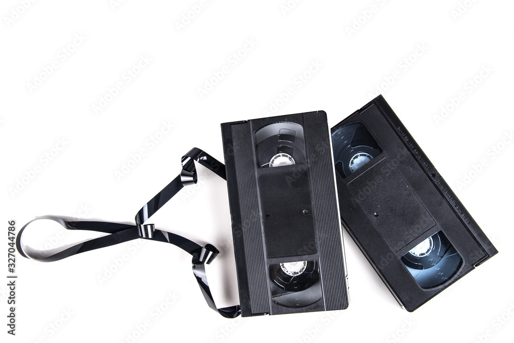 Obraz premium VHS video cassette isolated on white, retro video technology , analog magnetic tape 