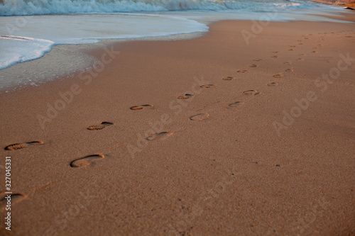 footprint of a couple in sandy beach