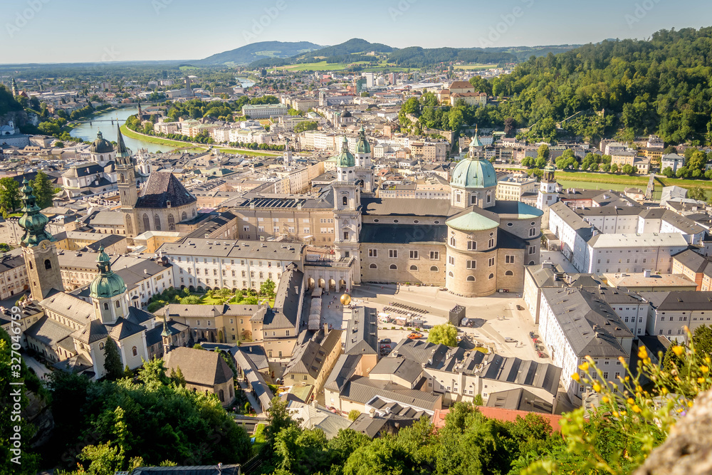 The Franciscan Church, Salzburg Cathedral and Stift St. Peter Salzburg in Salzburg over the banks of Salzach river as seen from Fortress Hohensalzburg