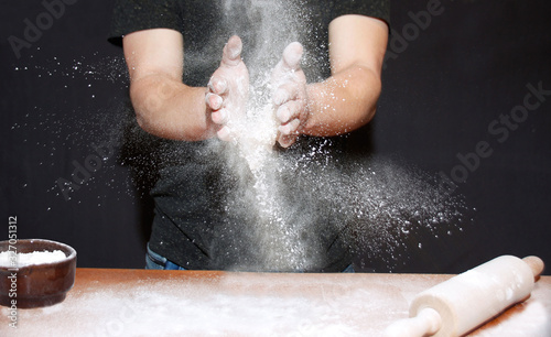 Professional Baker working with flour