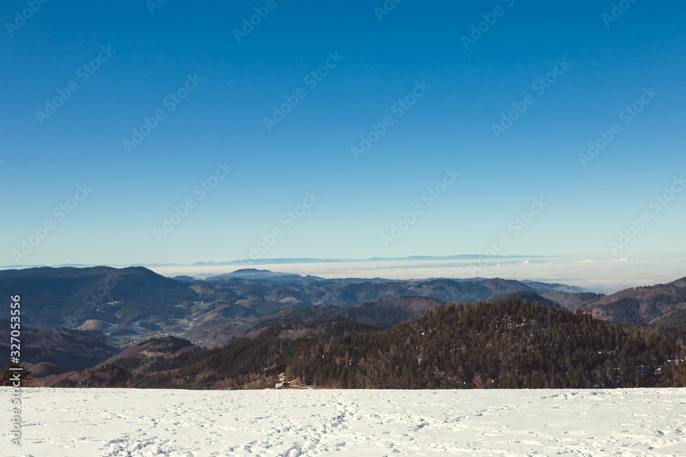 Stunning breathtaking views of the snowy Alps in Germany overlooking the French border