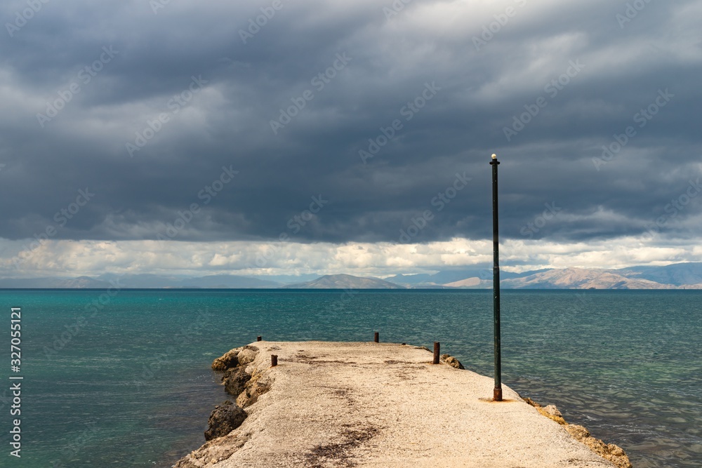 Empty pier in Ionian sea. Greece.