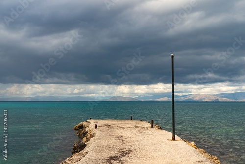 Empty pier in Ionian sea. Greece.