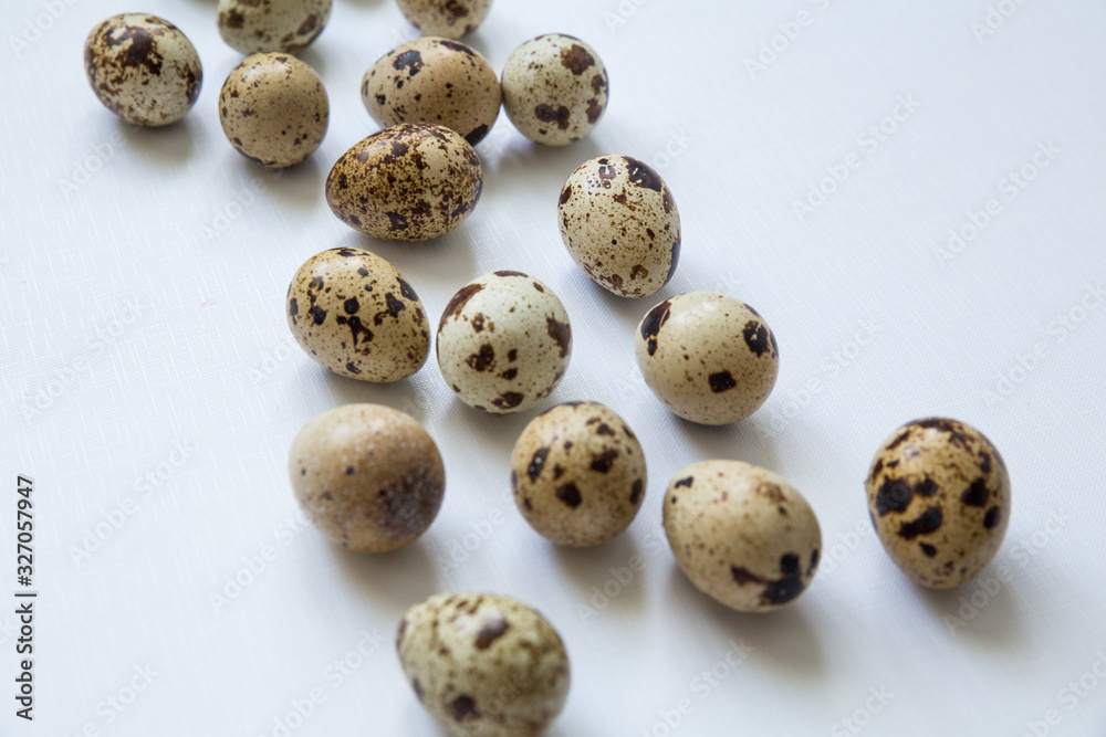 quail eggs on a white background. Easter and easter decoration