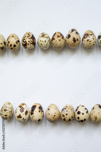 quail eggs on a white background. Easter and easter decoration