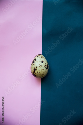 quail eggs on a pink background. Easter and easter decoration