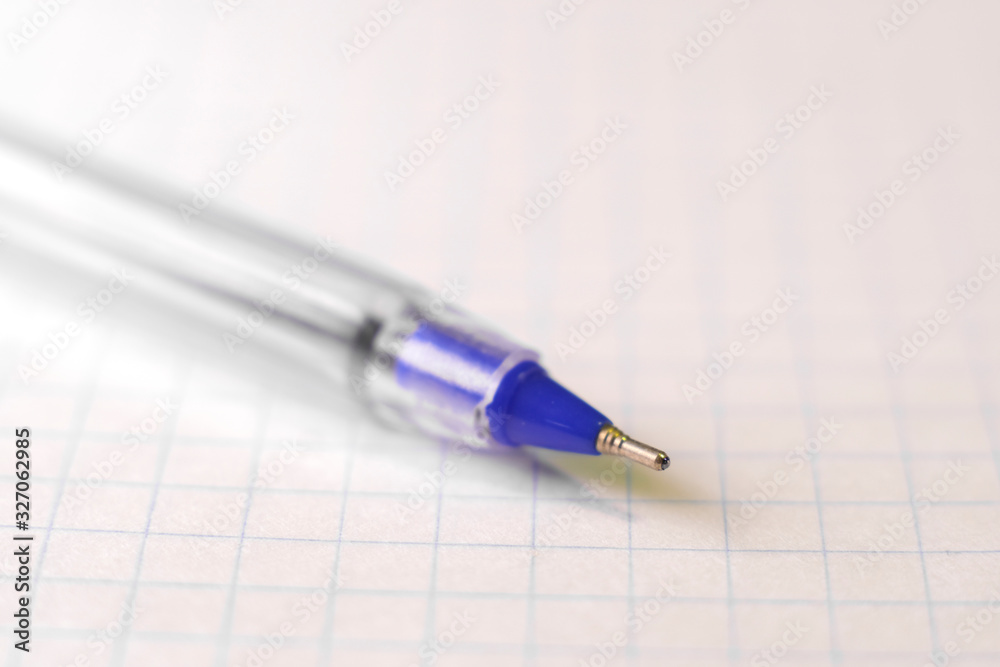 image of a pen on a notebook sheet image of a pen on a notebook sheet